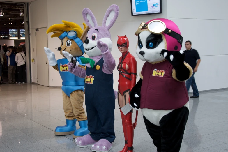 a group of cartoon characters posing for a po