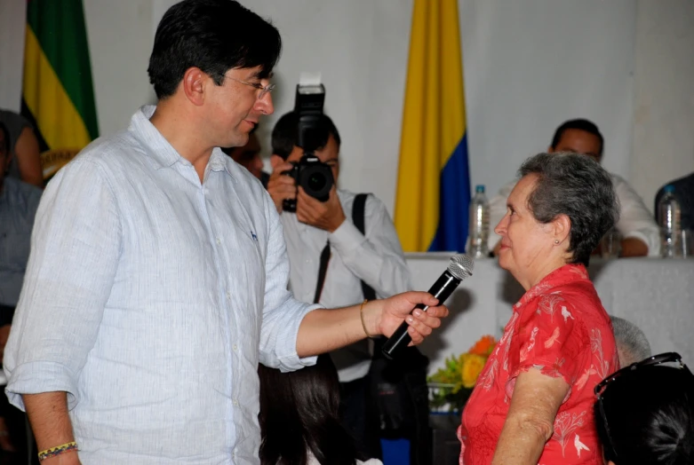 a man showing a woman soing on his camera