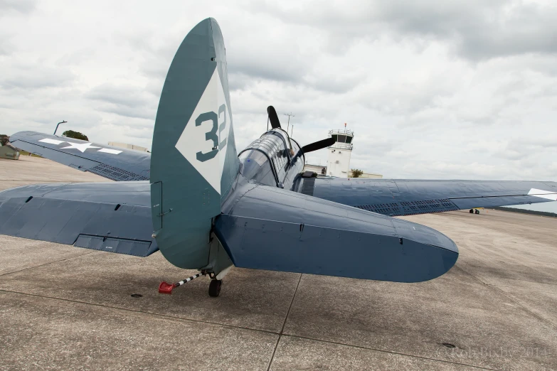 a plane is shown parked on the tarmac