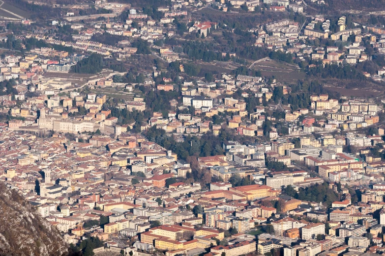 an overview of a city area that is surrounded by mountains