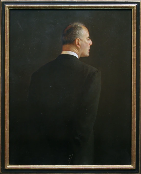 a portrait of a man in a black suit