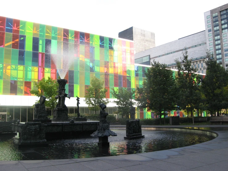 this po shows a brightly colored building with a waterfall