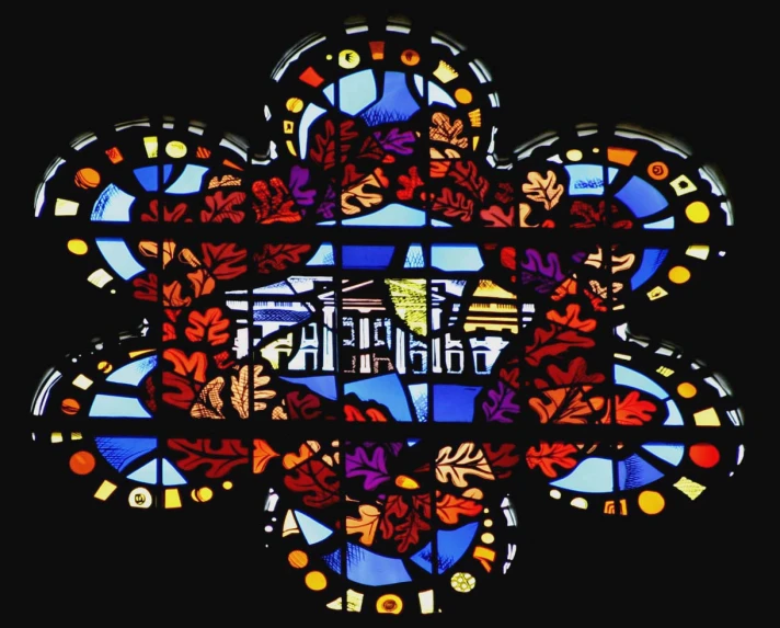 a stained glass piece with many different designs