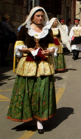 a group of women in traditional clothes