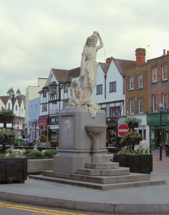 there is a statue in the middle of the street