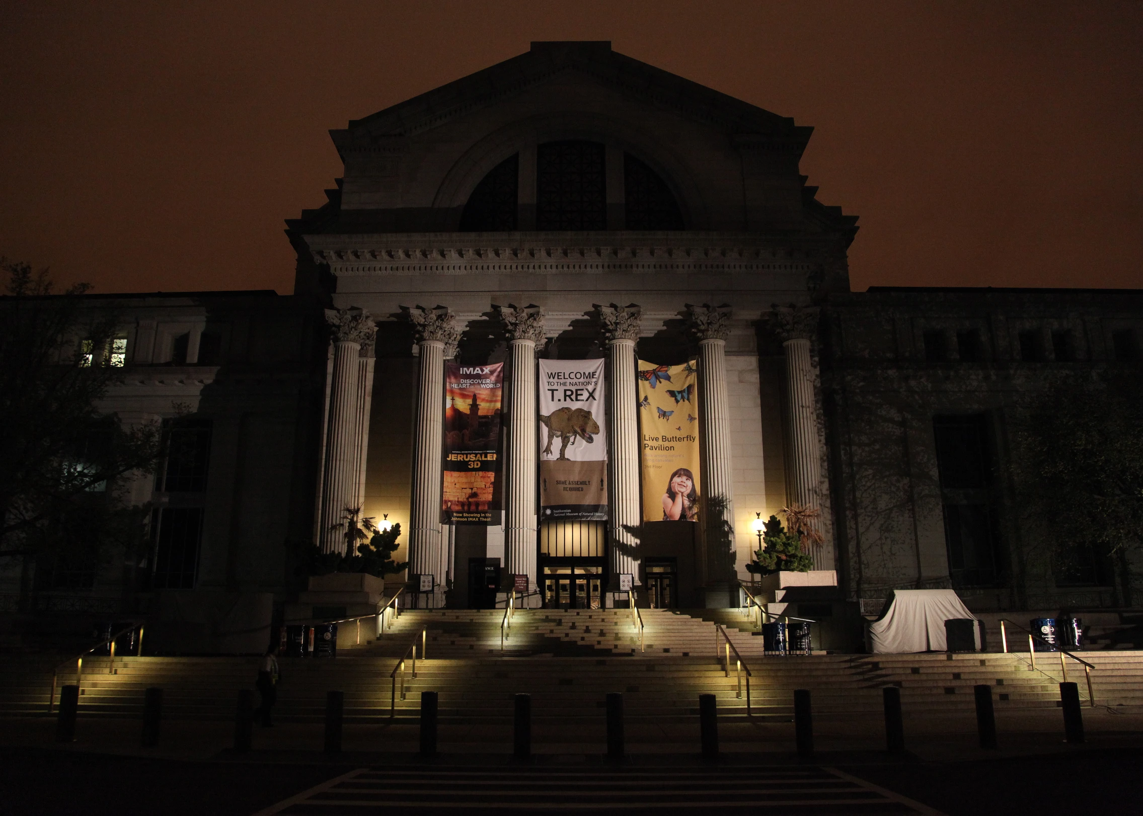 a large building with steps leading into the front