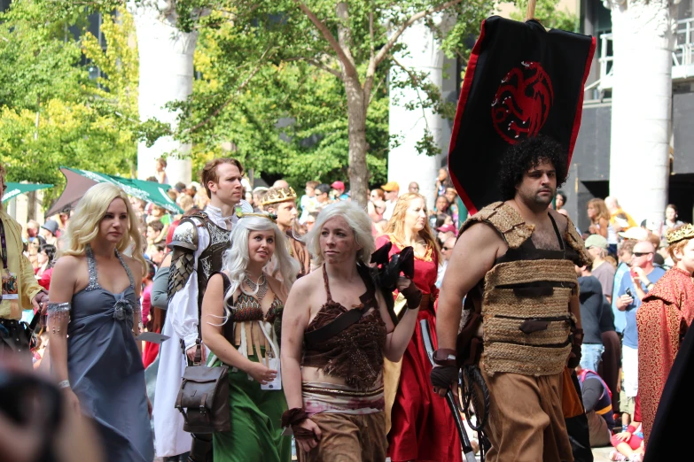 the costumed people are dressed up as they take part in a festival