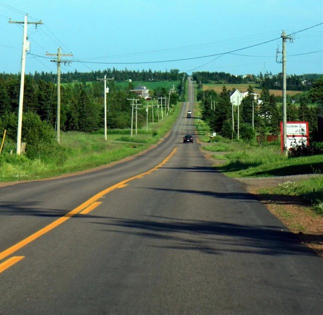 car on a rural road going through a remote area