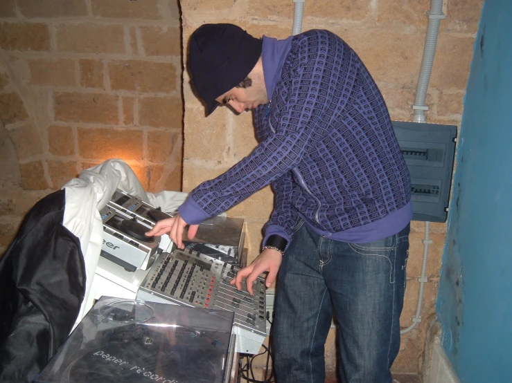 a person is working on a computer in a room