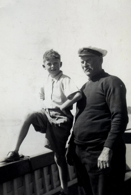 a man and boy on a dock together