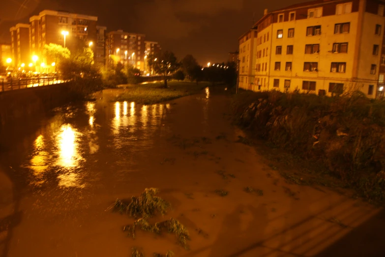 a city with a river on both sides at night