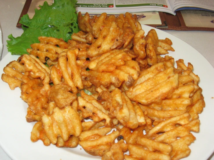 an image of french fries with lettuce