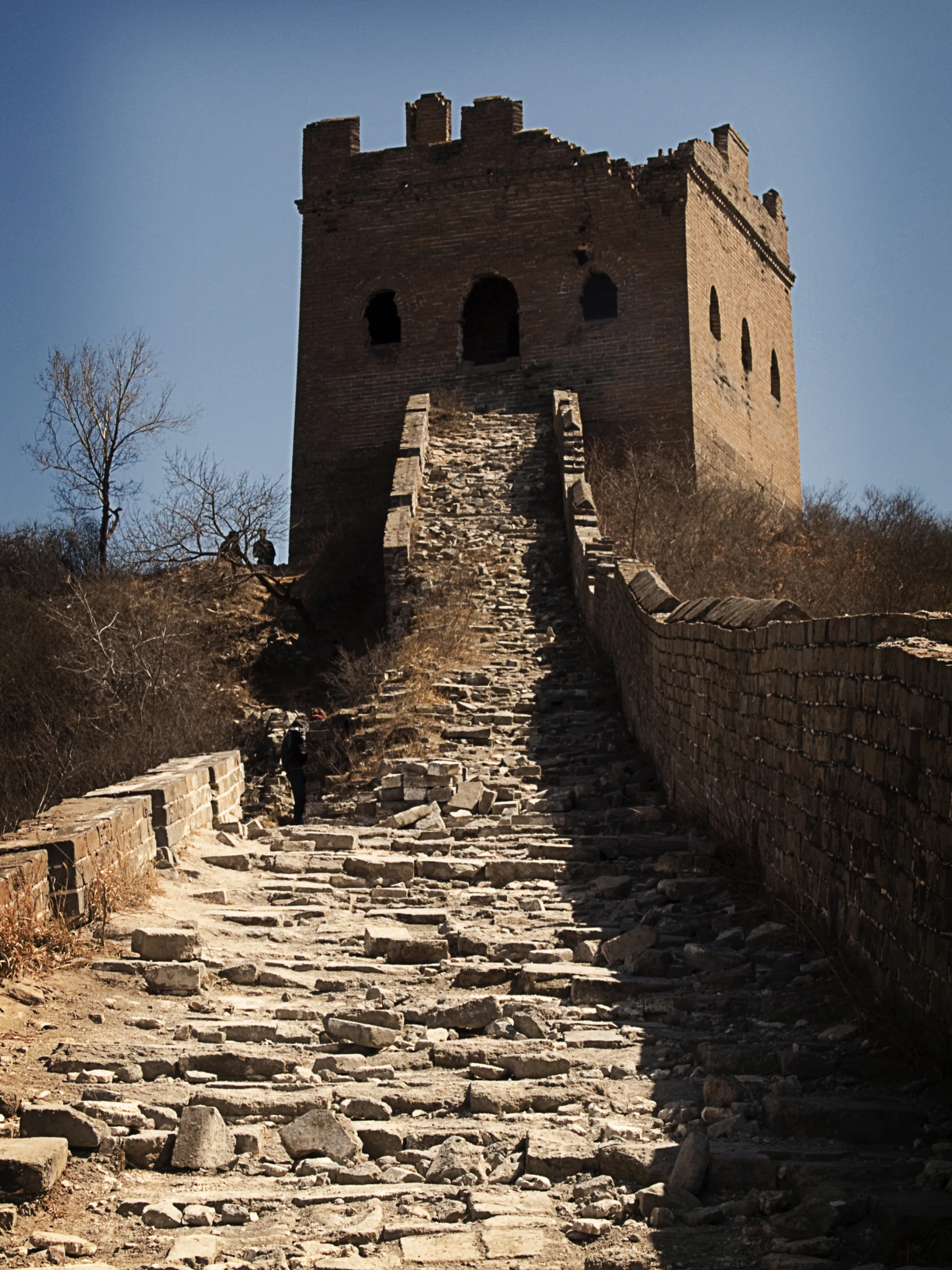 stone stairs going up the side of a steep wall