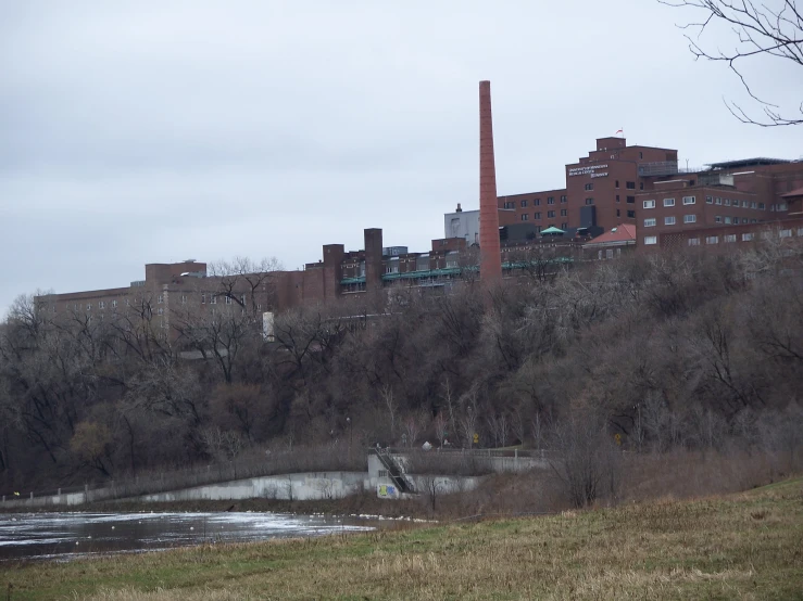 there is a factory type factory on a hill