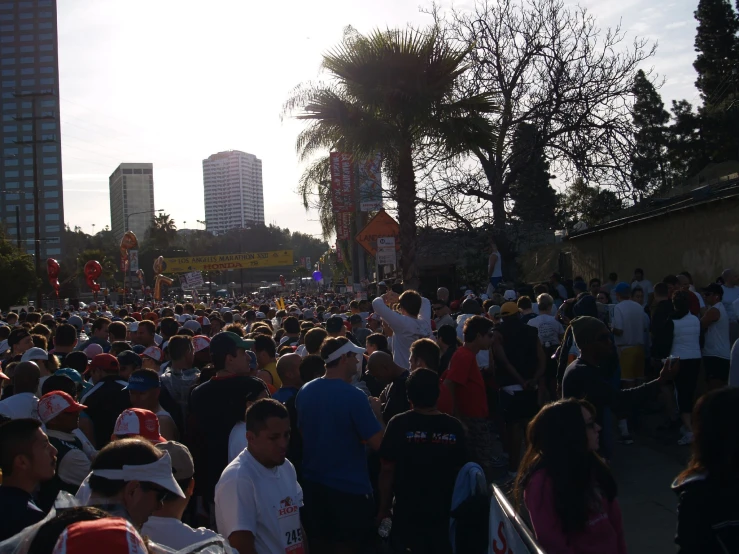 the people are gathered together for a parade