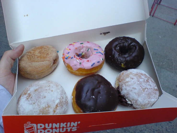 a box that has different flavor donuts in it