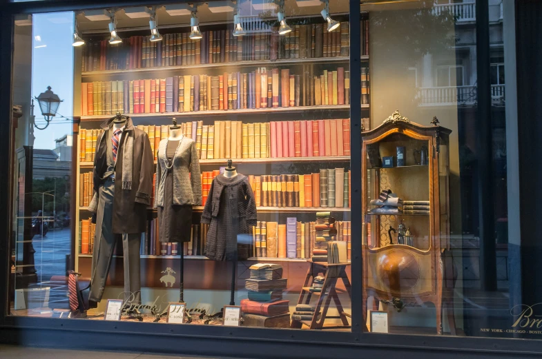 window display with many books, shoes and other items