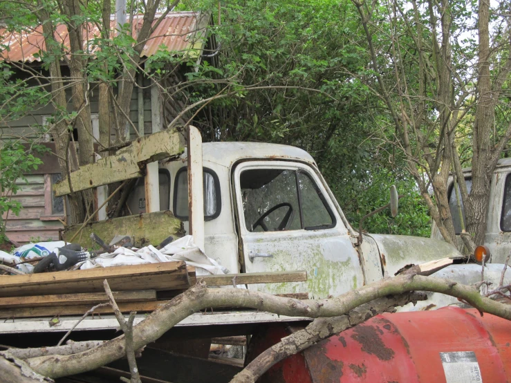 a very old truck that has been parked