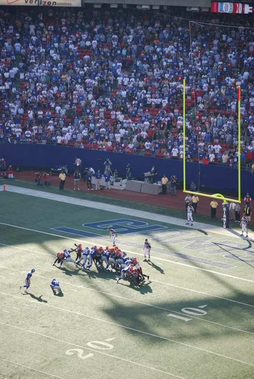 players on a football field playing with each other