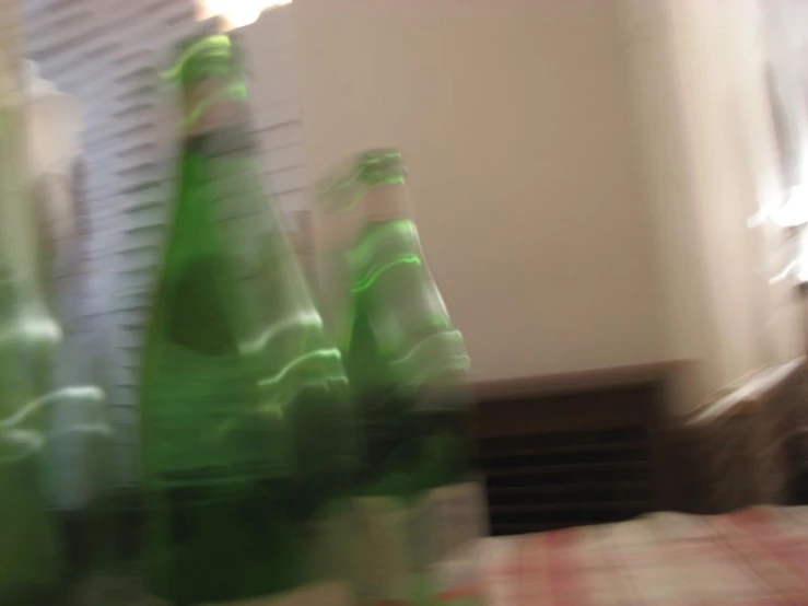 a blurry po of several empty bottles