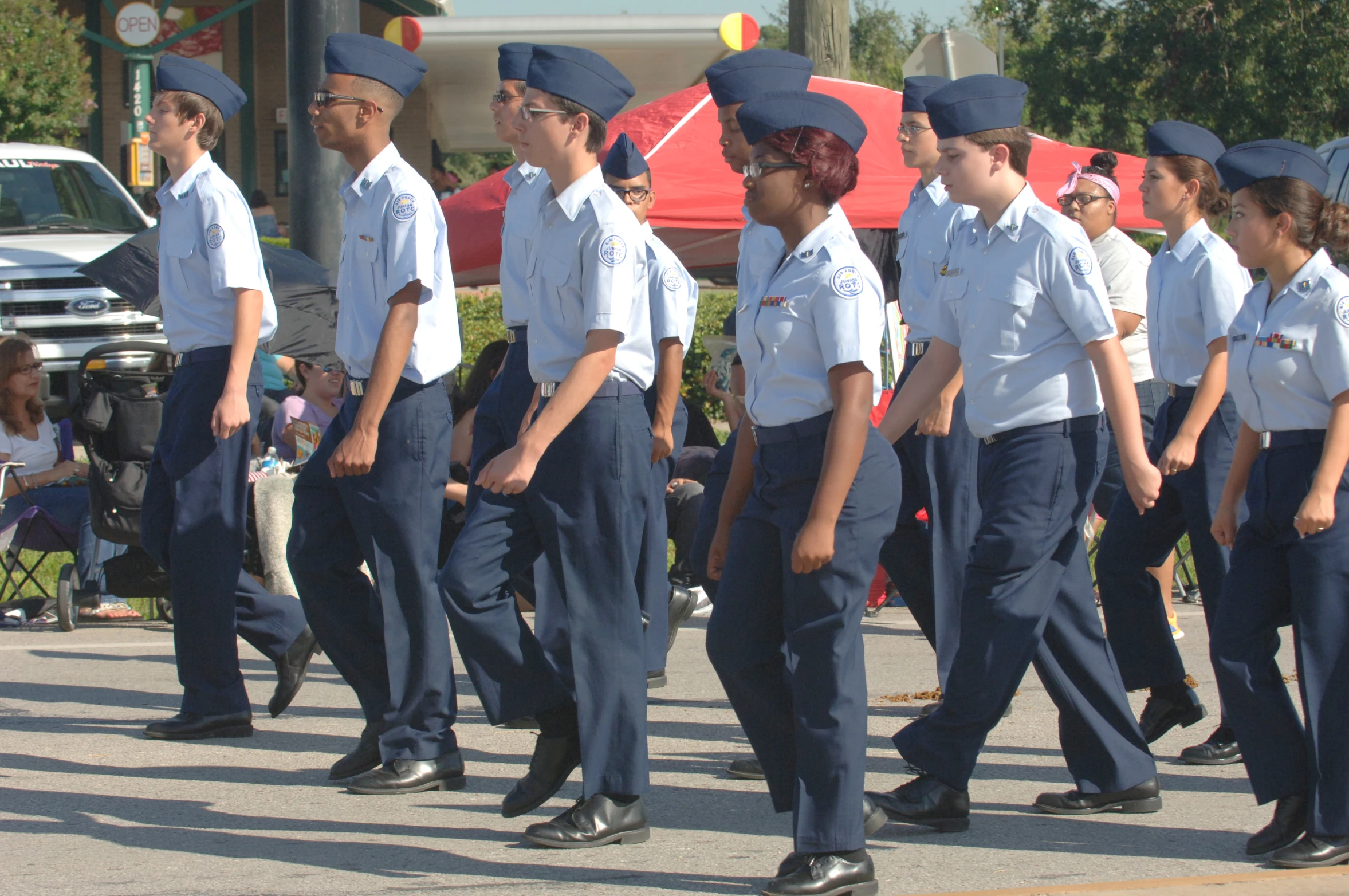 a group of young women dressed in uniforms