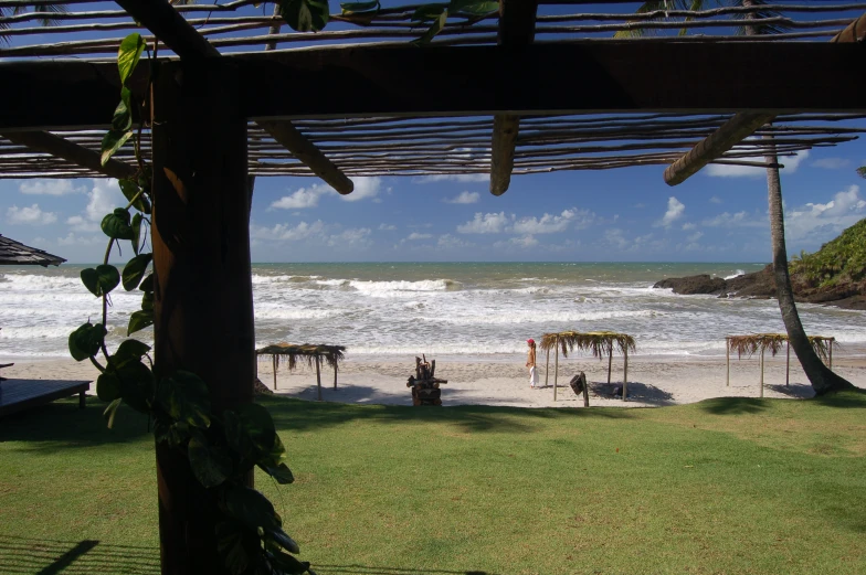 several chairs and umbrellas are sitting near the beach