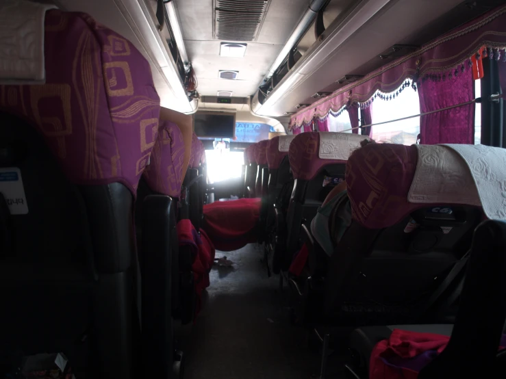 a po of a room full of seats in the bus