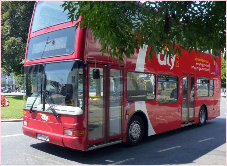 there is a double decker bus that is red