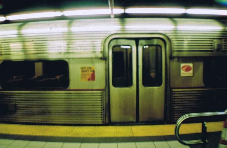 a subway station with the door open and there is no people inside