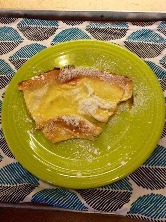 a slice of pastry on a plate on a table