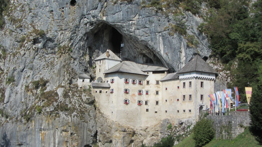 a large building built into the side of a mountain