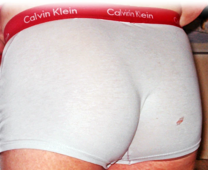 the bottom of a man's underwear showing his lower half