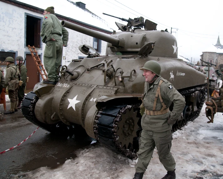 the soldier has stopped to see what's inside his tank