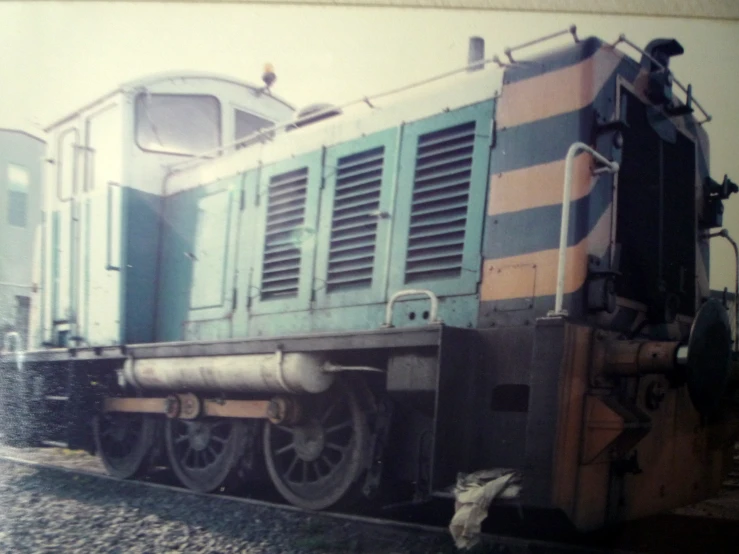 an old picture of a train and its equipment