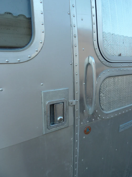 a close up of a window on the inside of a plane