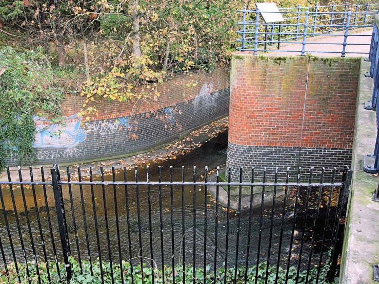 a gated entrance to a large body of water