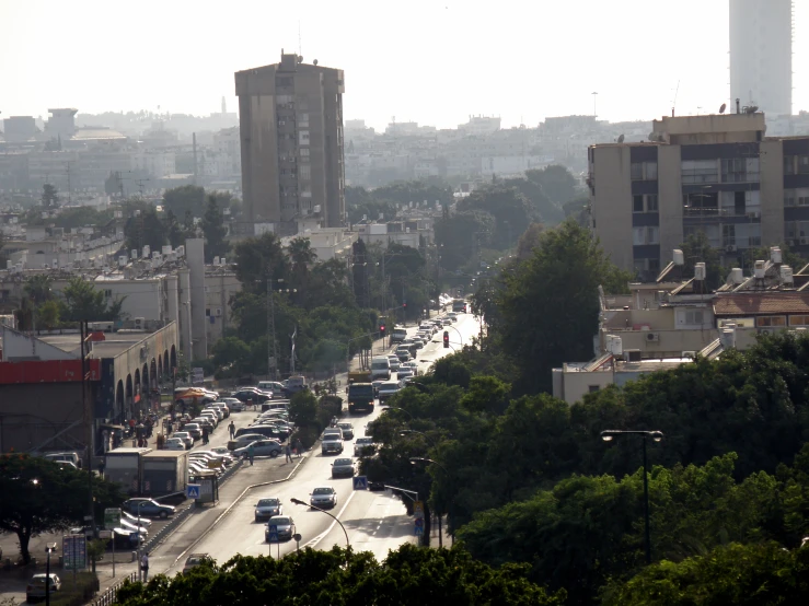 busy urban street filled with lots of traffic in a city