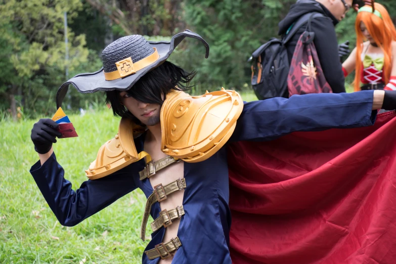 a person that is holding a hammer with costume on