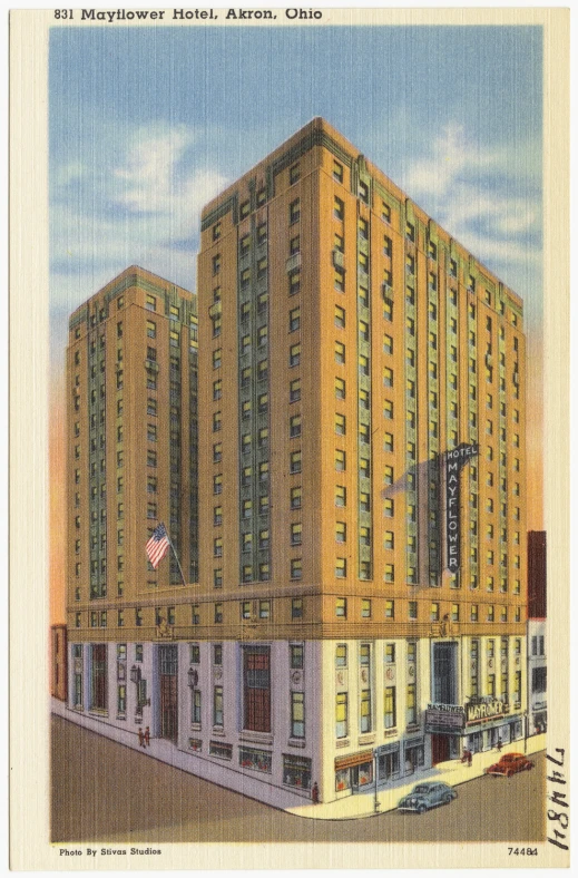 a postcard with the building that is made up of large, yellow blocks