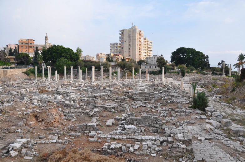 many white pillars sitting on top of rocks