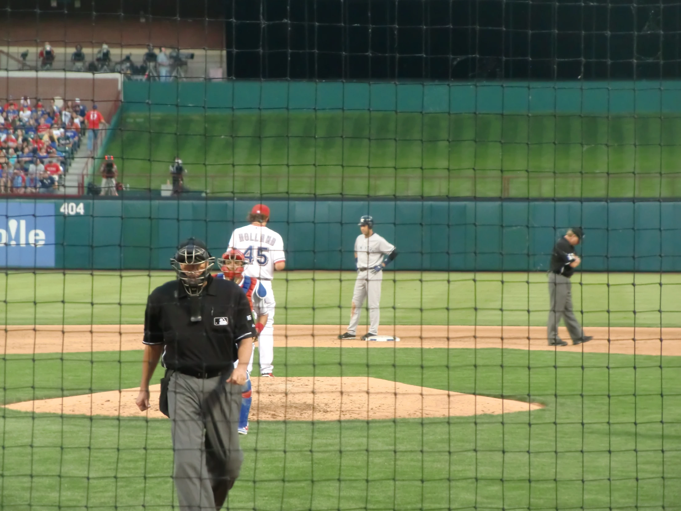 the view from behind the mesh of home plate