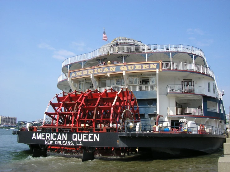 a large ship is floating in the water