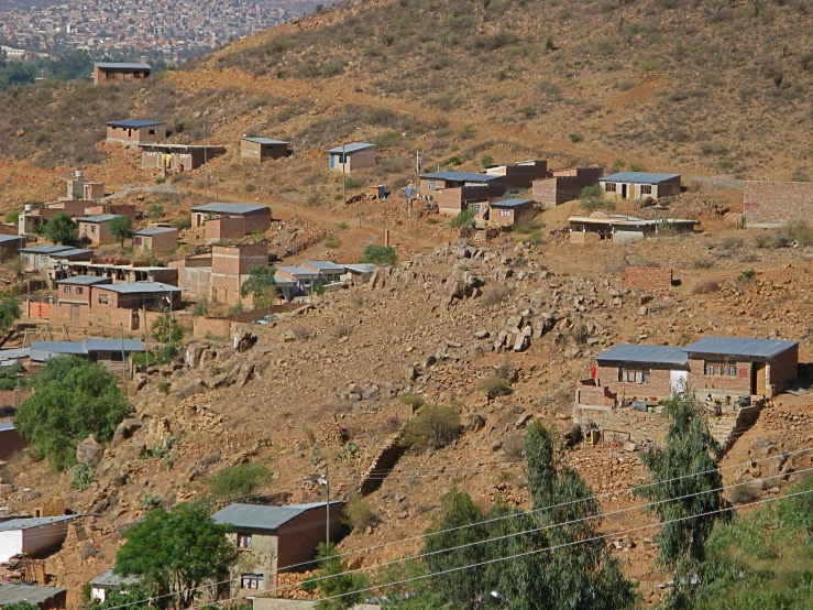 an image of a view of a town on the top of a hill