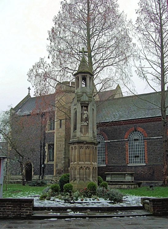 a large church is shown on a snowy day