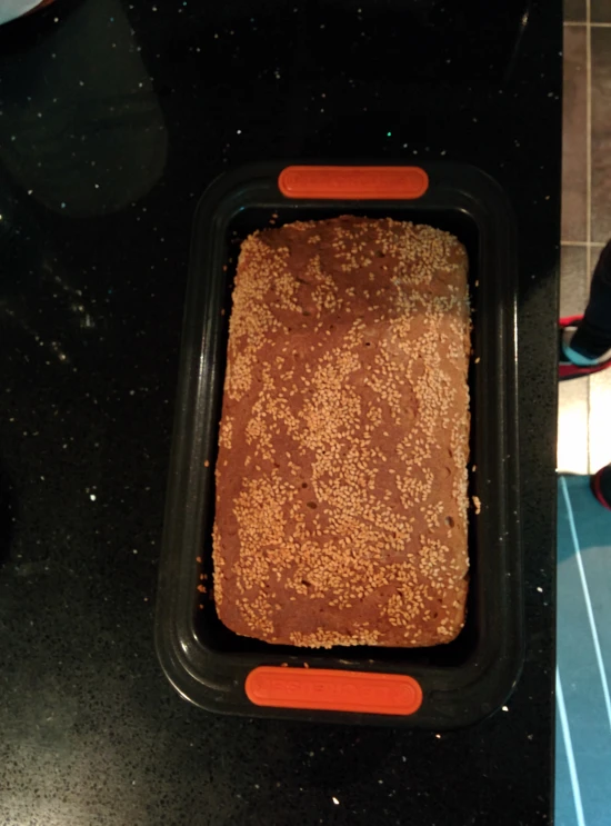 an uncooked pan is in the shape of a square cake