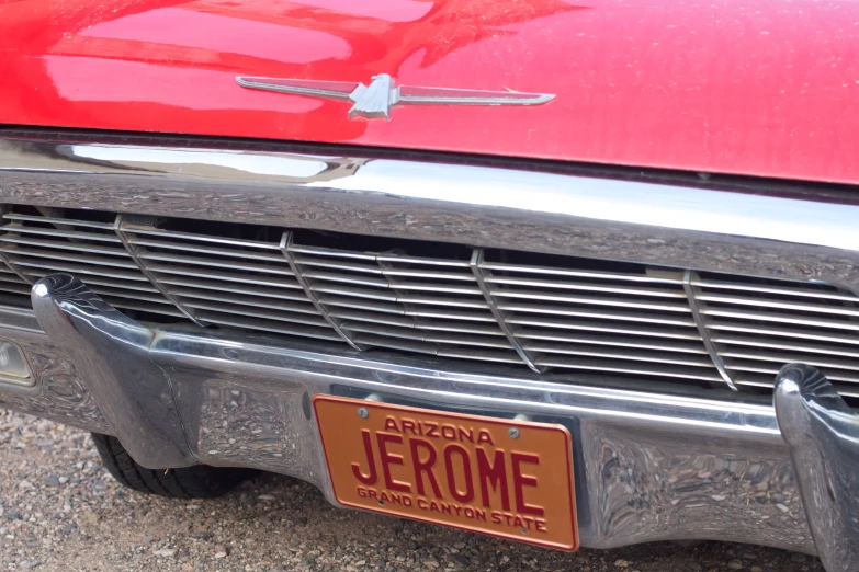 an old car has the license plate of someone's favorite automobile