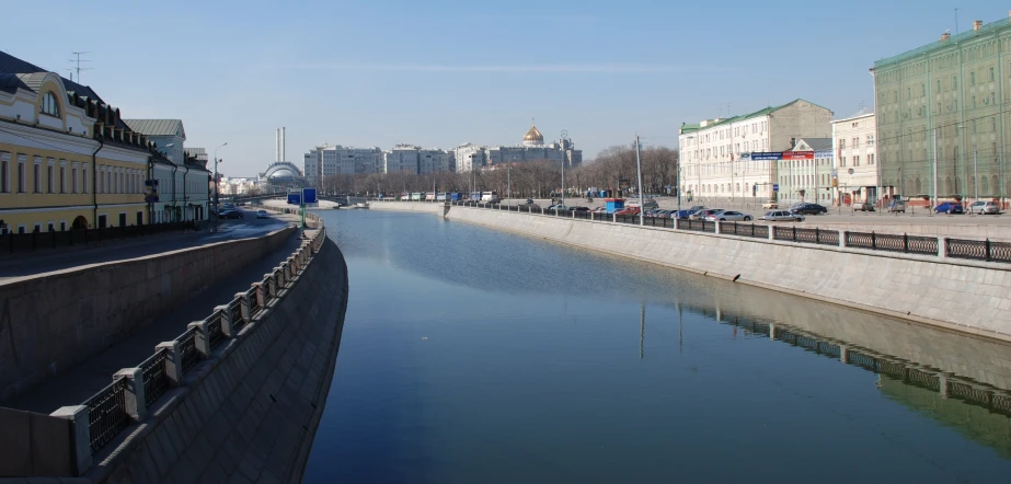 the waterway running along side of the buildings