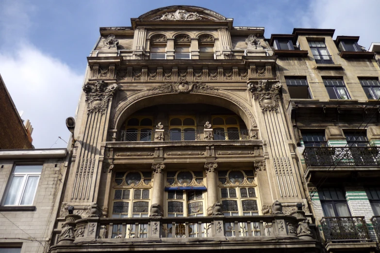 an old building with balconyes, windows and balconies