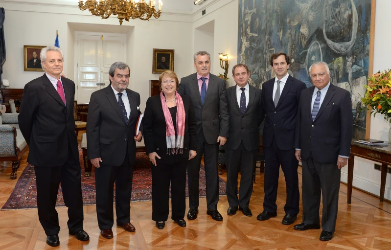 a group of men in suits standing together