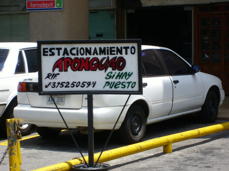 a sign that reads estacionamamentoe to rongbag